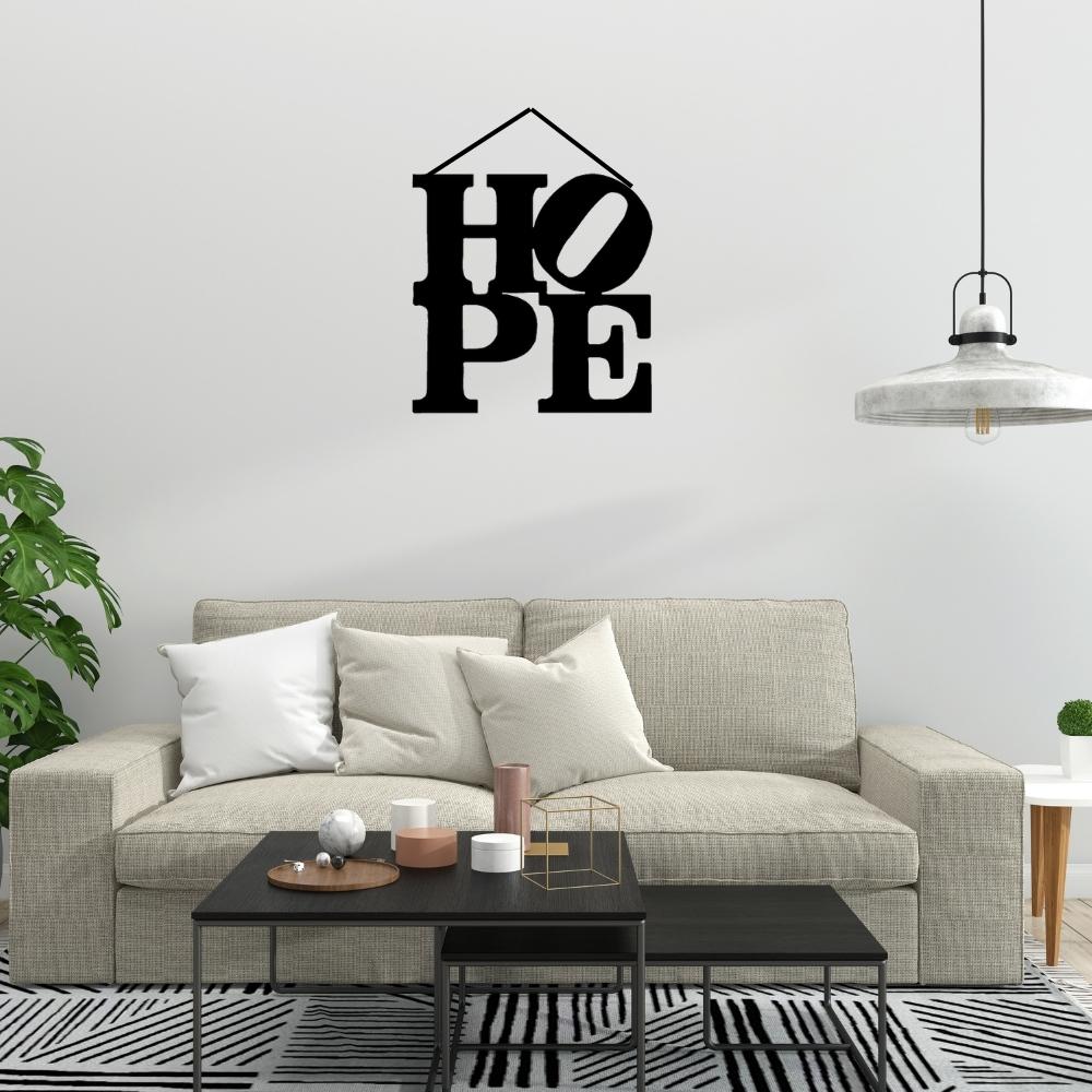 Precut glass shape of HOPE as wall art.