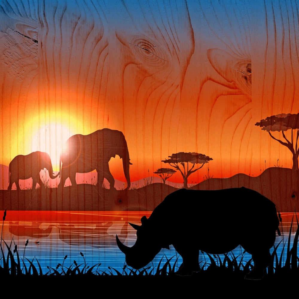 Precut glass shape of a rhino at a watering hole.