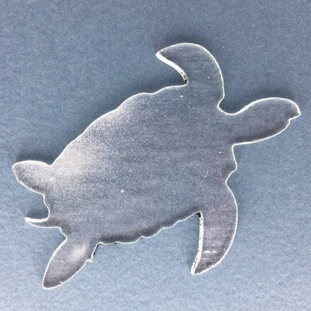 Precut glass shape of a turtle in clear glass.