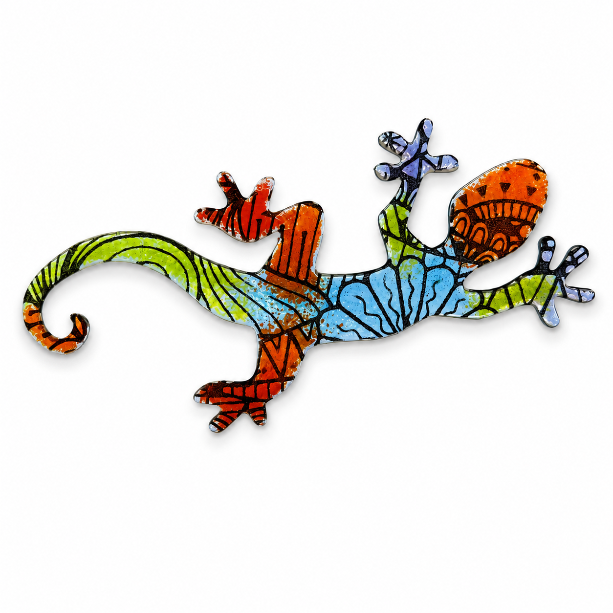 Colorful fused glass gecko featuring an abstract doodle silk screen pattern in orange, blue, green and purple on a white background.