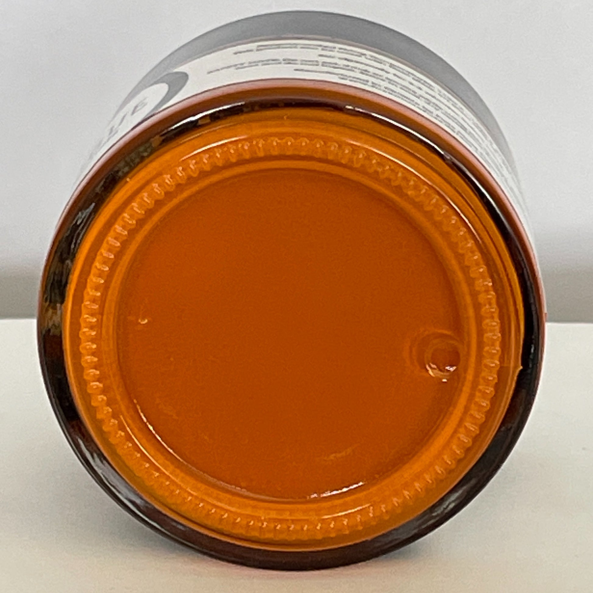 Jar of Mandarin Orange screen printing paste showcasing its vibrant hue and smooth consistency