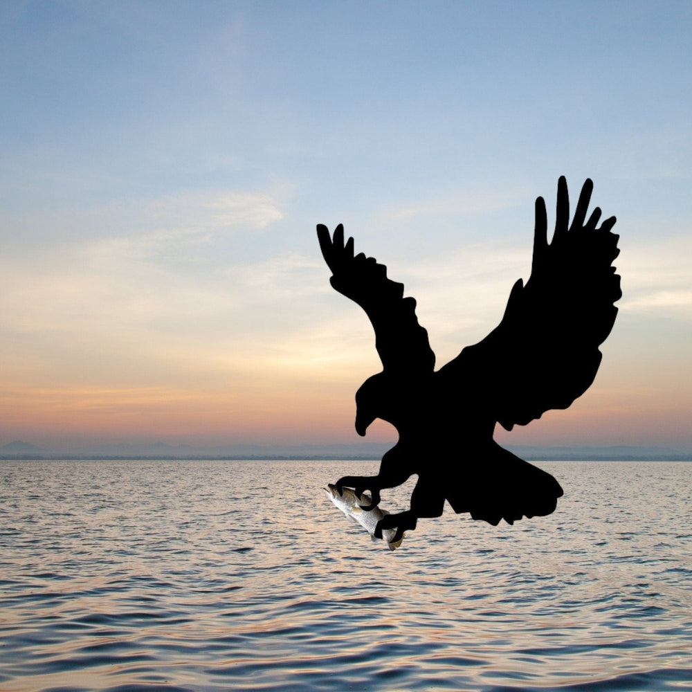 Precut glass in shape of attacking eagle over water