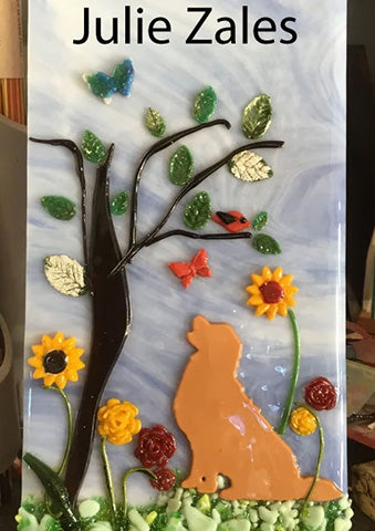 A precut golden retriever in a fused glass art piece. This one is by Julie Zales.