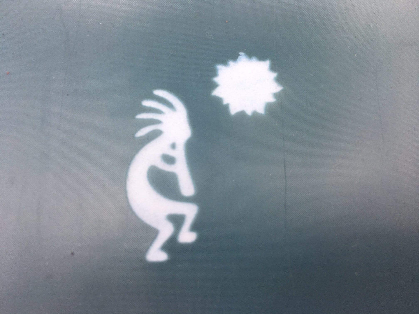 Kokopelli and the sun silk screen design