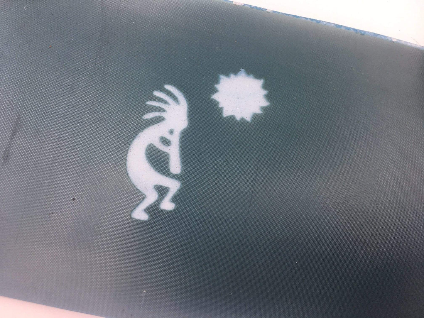 Kokopelli and the sun silk screen design
