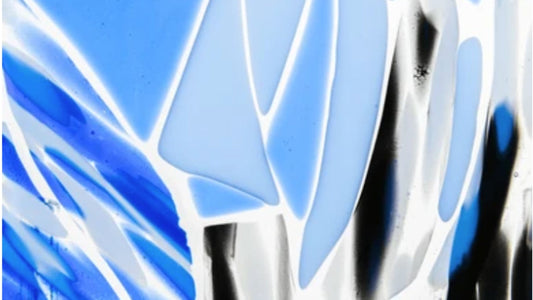 Fused Glass in a variety of blue, grey black and white art glass.