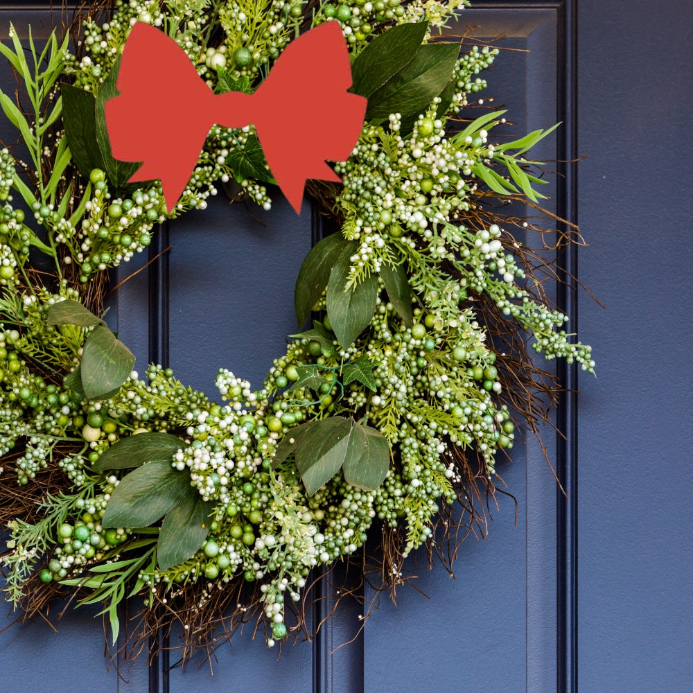 Precut glass shape of Christmas bow on wreath.