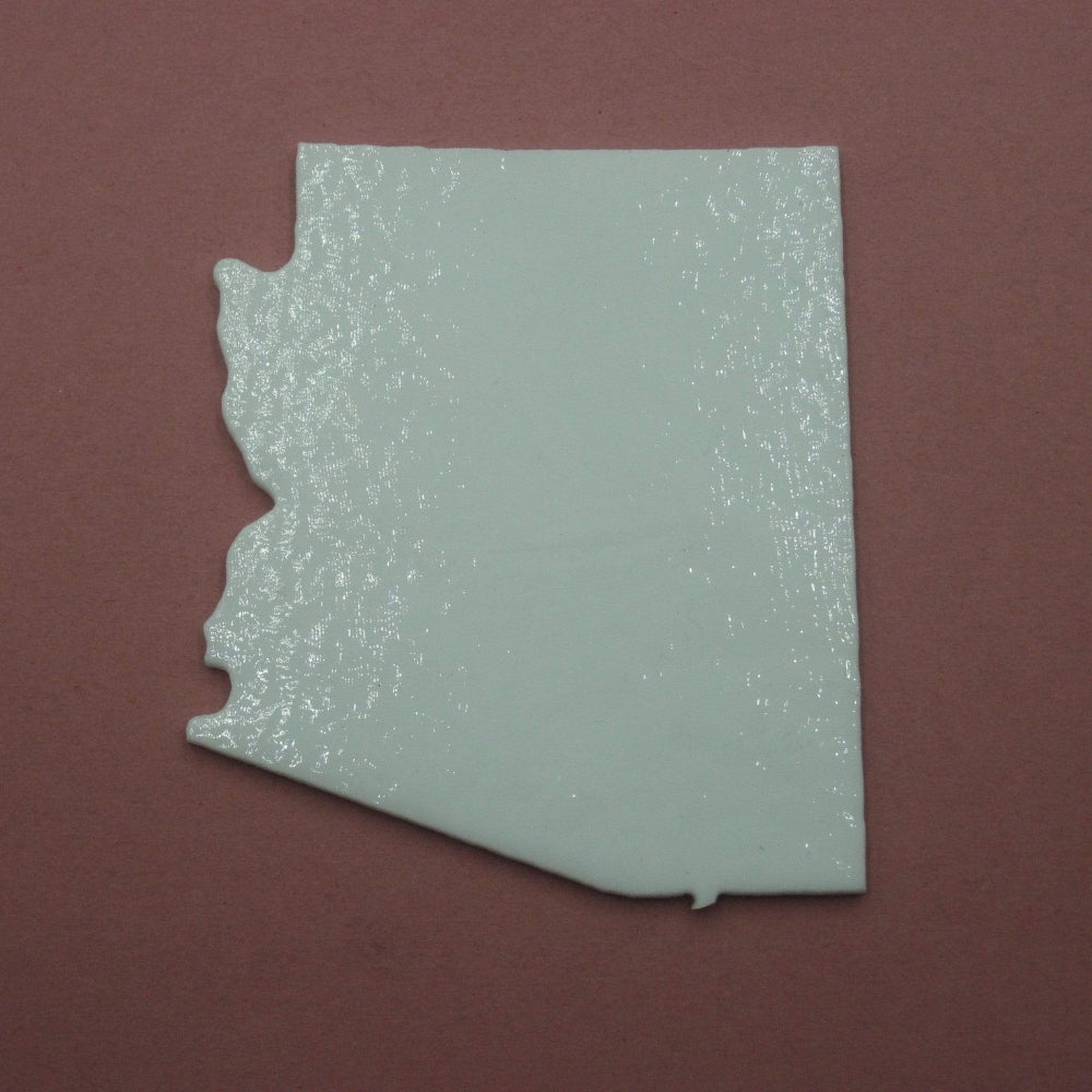 Precut glass shape of Arizona as white glass.