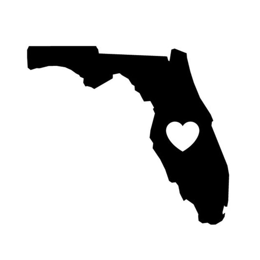 Precut glass shape of Florida with a heart cut out.