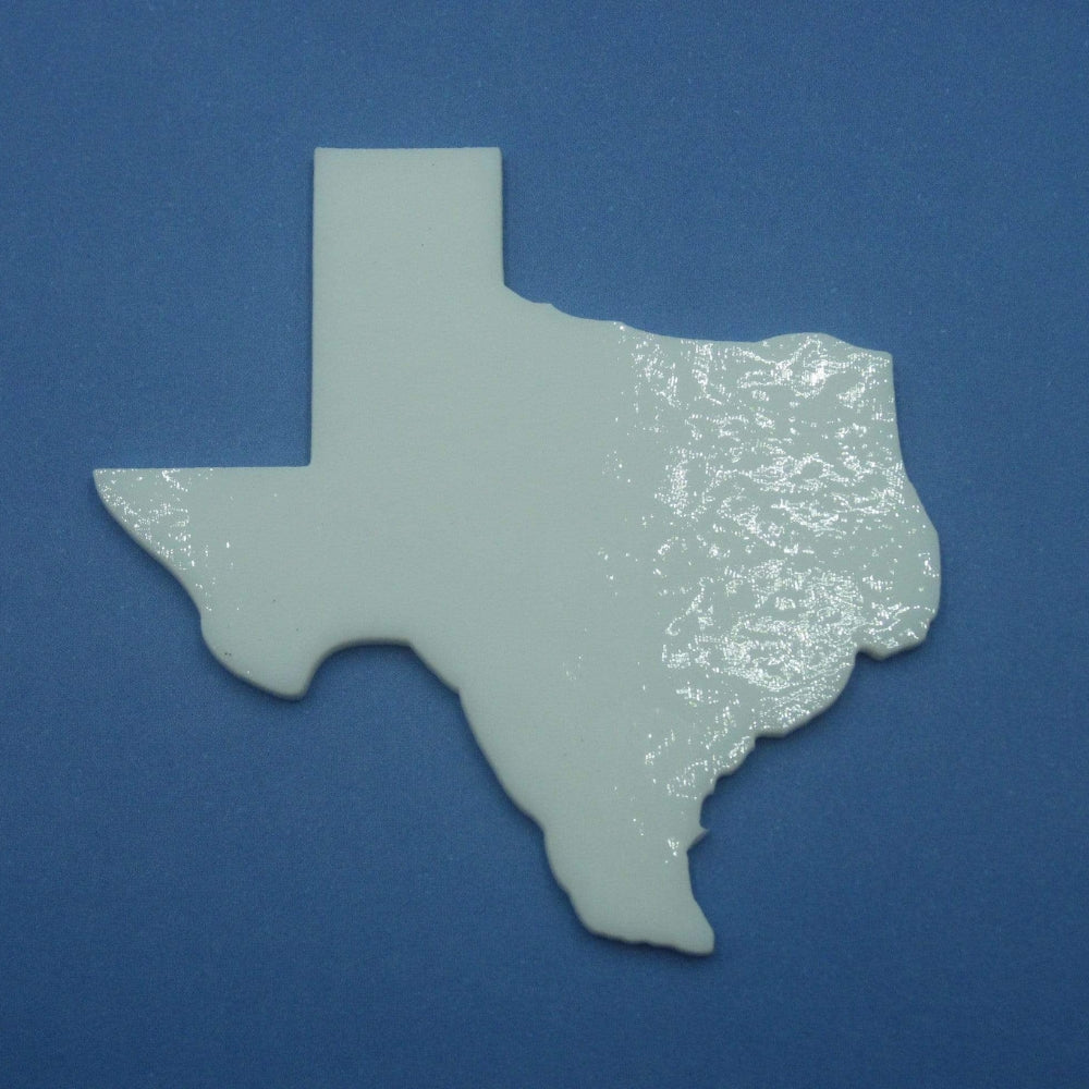 Precut glass shape of Texas in white COE 90 glass.