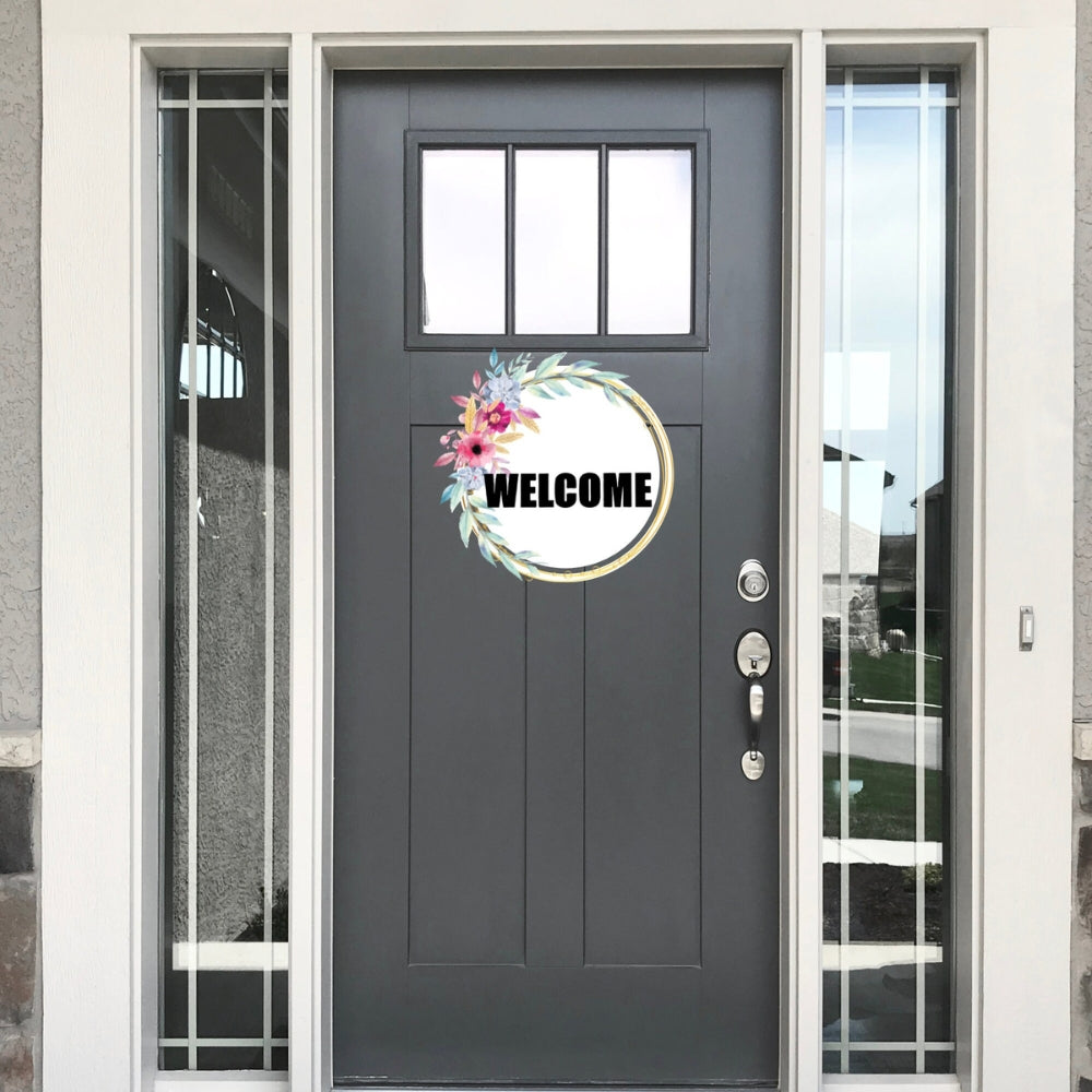 Precut glass shape of the word WELCOME on a door.