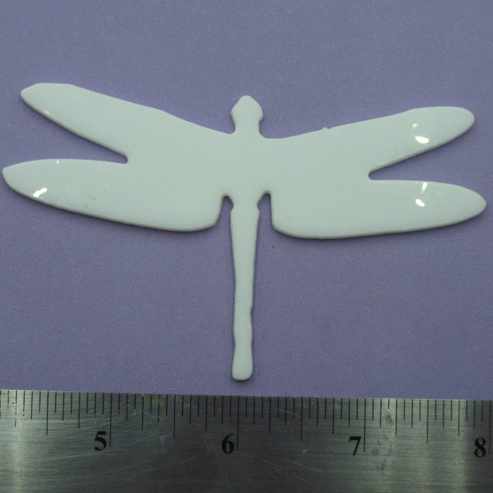 Precut glass shape of dragonfly size.