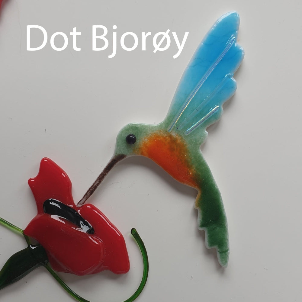 Precut glass shape of hummingbird in art piece by Dot Bjoroy.