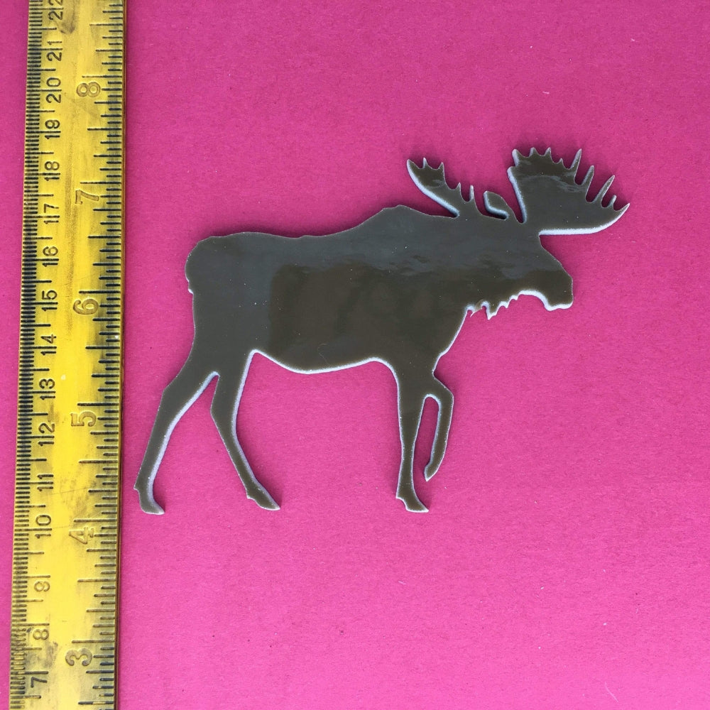 Precut glass shape of a moose.