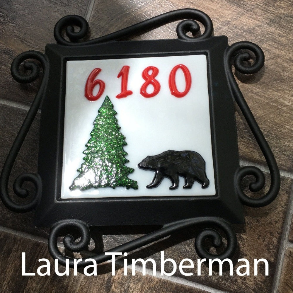 Precut glass shape of Script numbers in art piece by Laura Timberman.