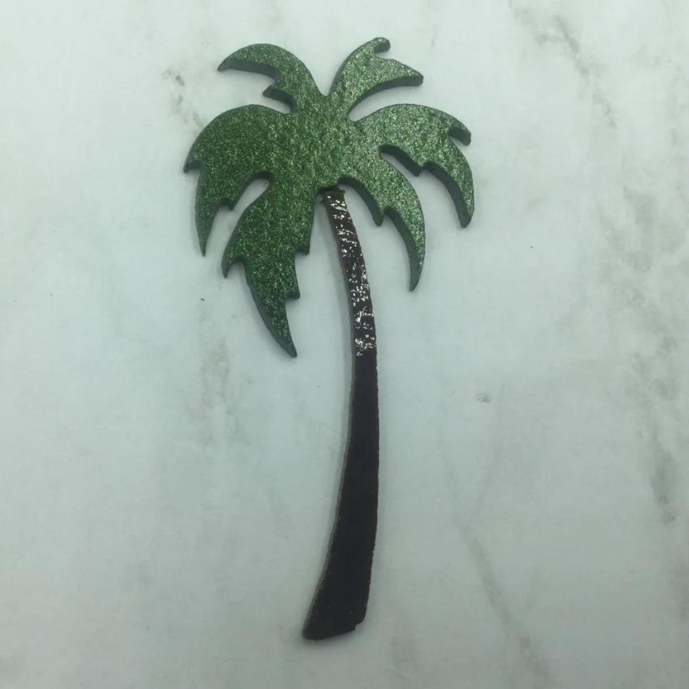 Precut glass shape of a palm tree in green and brown glass