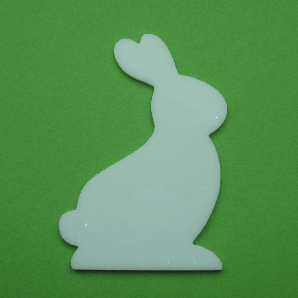 Precut glass shape of a rabbit in white glass.