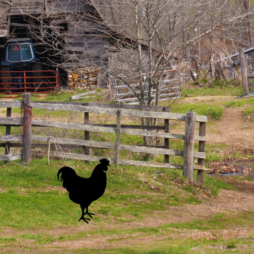 Precut glass shape of a rooster on a farm.