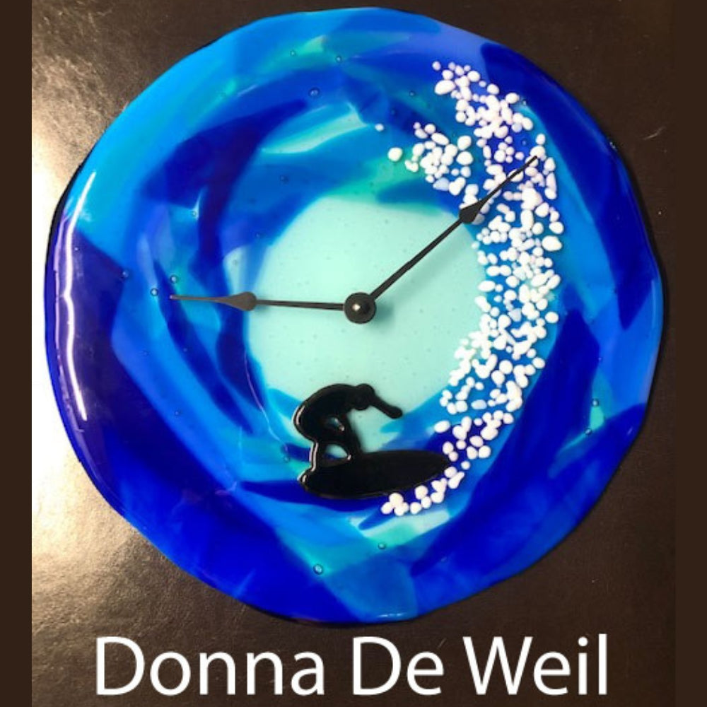 Precut glass shape of surfer #1 in a fused art piece by Donna De Weil.