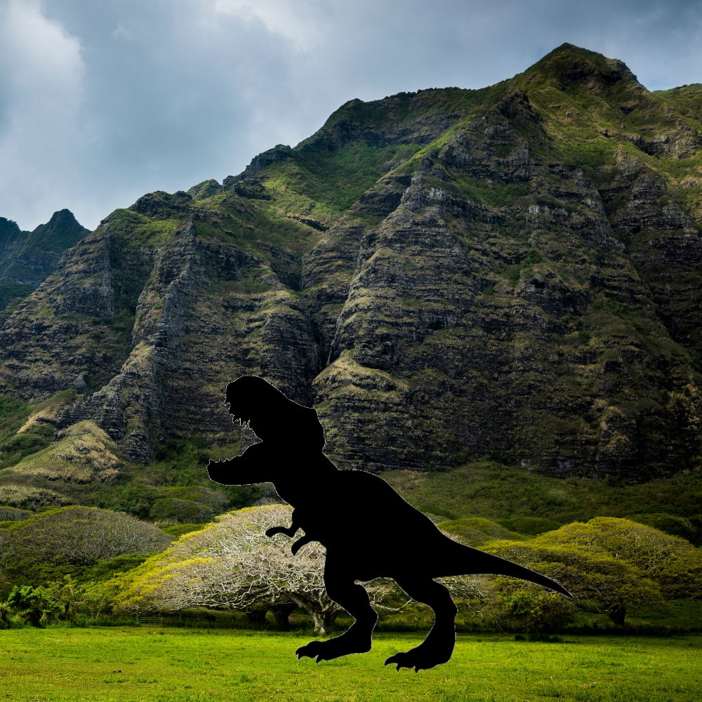 Precut glass shape of a T-Rex on an island.