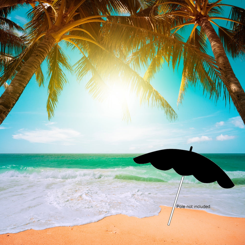 Precut glass shape of an umbrella on a beach.