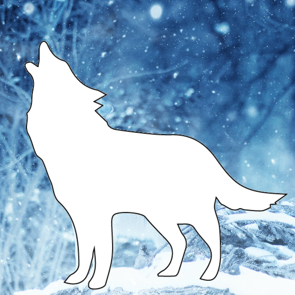 Precut glass shape of a wolf howling in the snow.
