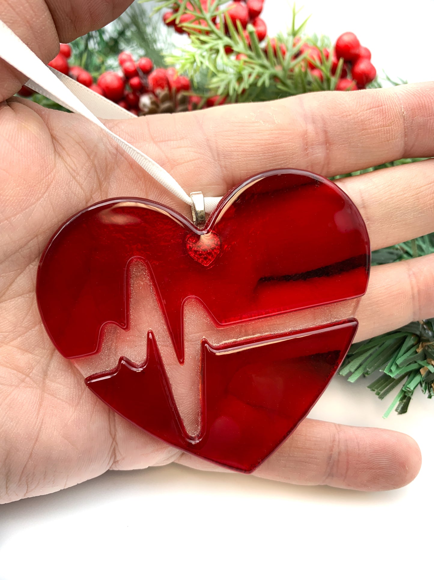 Heartbeat fused glass ornament displayed as a nurse or cardiac recovery gift