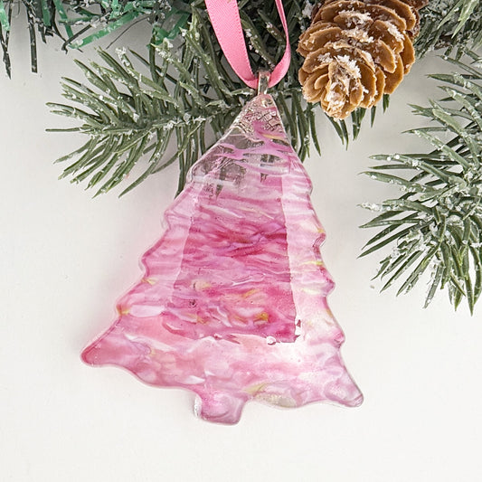Pink fused glass Christmas tree ornament handmade with rare pink glass and a marbled pink-and-clear design.
