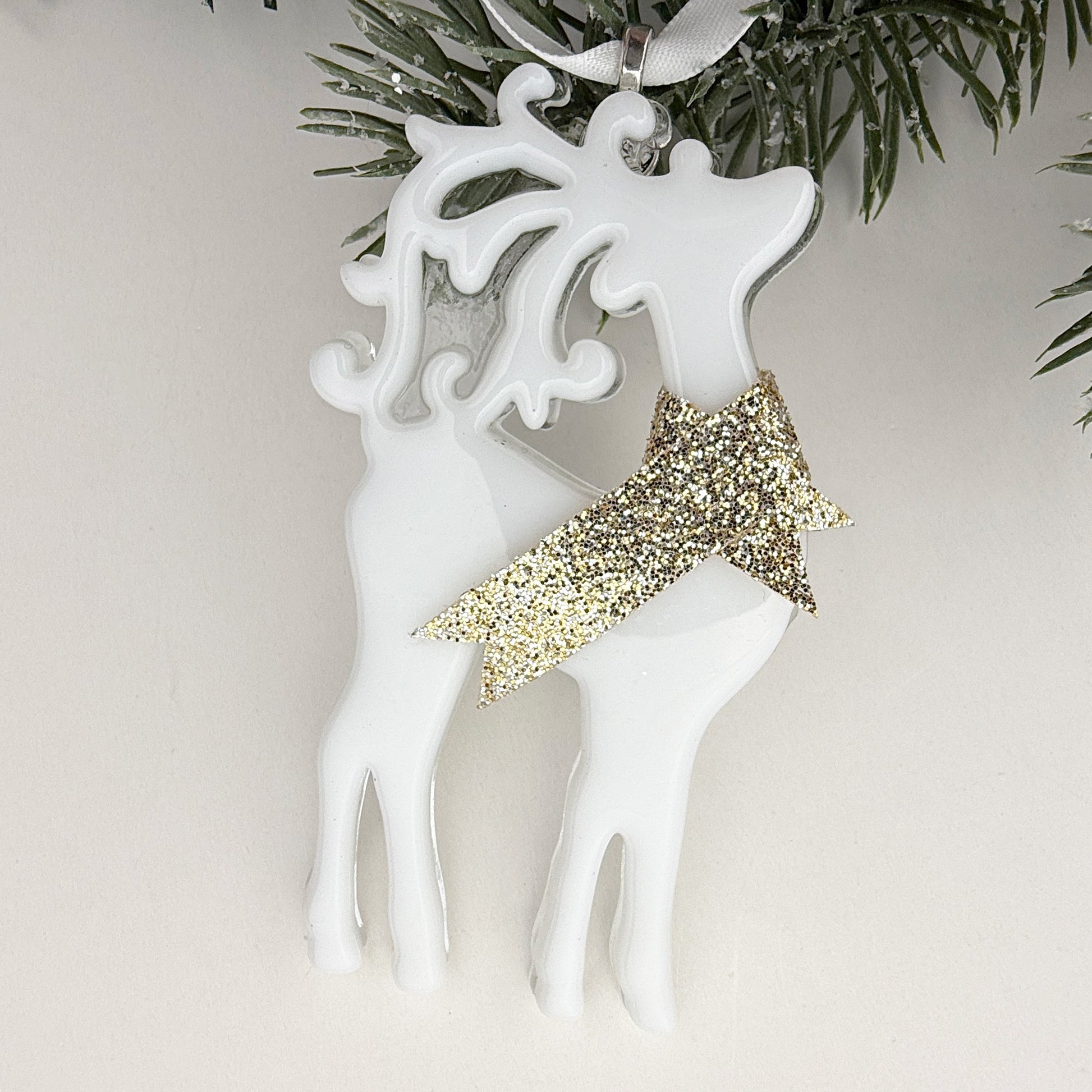 Elegant white reindeer Christmas ornament with a sparkling gold scarf, handmade holiday décor for all-white trees.