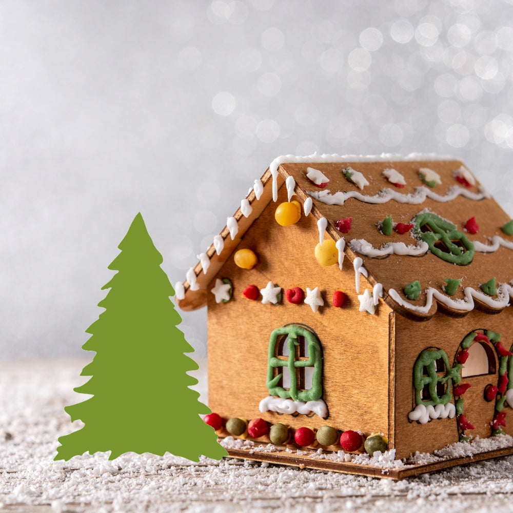 Precut glass shape of christmas tree #2 with a gingerbread house.