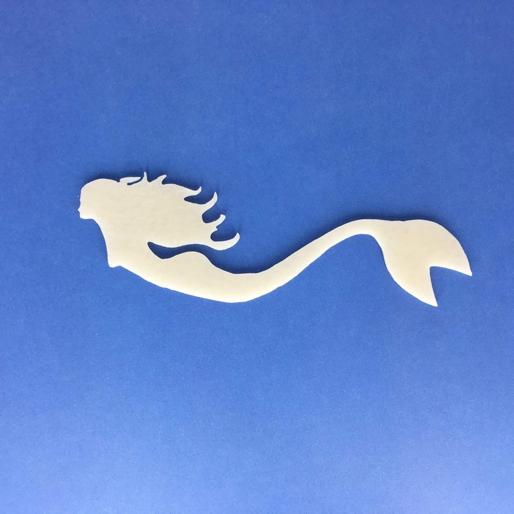 Precut glass shape of a mermaid.