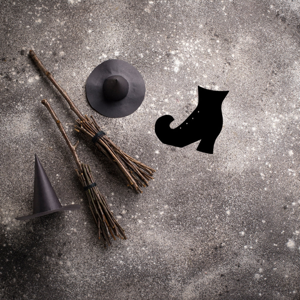 Witch boot made of black coe 96 oceanside glass with witch hat and broom